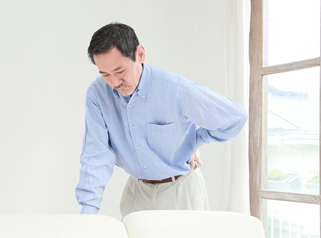 不調を感じる男性